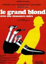 LE GRAND BLOND AVEC UNE CHAUSSURE NOIRE