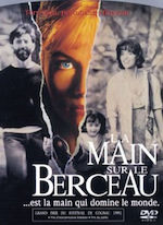LA MAIN SUR LE BERCEAU